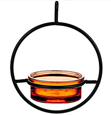 An orange glass bird feeder with black metal stand over a white background.