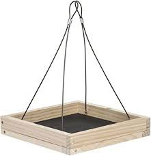 A platform bird feeder on a white background